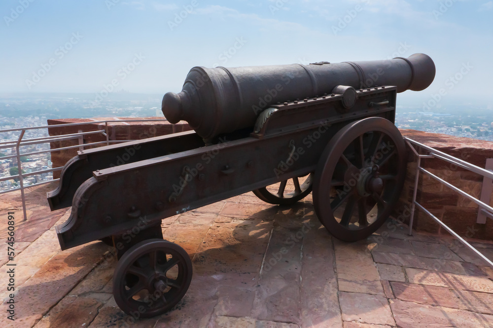 Famous Kilkila cannons on the top of Mehrangarh fort. overlooking city of Jodhpur for proctection since ancient times. Huge long barrel is a favourite tourist attraction. Jodhpur, Rajasthan, India. Famous Kilkila cannons on the top of Mehrangarh fort. overlooking city of Jodhpur for proctection since ancient times. Huge long barrel is a favourite tourist attraction. Jodhpur, Rajasthan, India.