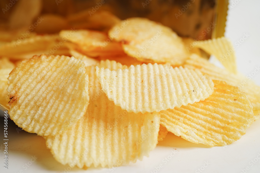 Potato chips in open bag, delicious BBQ seasoning spicy for crips, thin slice deep fried snack fast food. Potato chips in open bag, delicious BBQ seasoning spicy for crips, thin slice deep fried snack fast food.