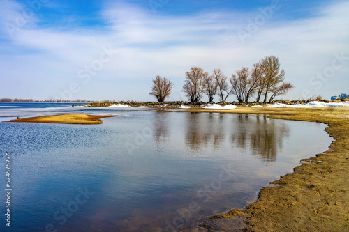 Scenic view of winding shoreline of Dnieper river, Cherkasy, Ukraine at early spring day
