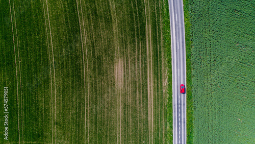Car surrounded by fields, Genolier, Vaud Canton, Switzerland