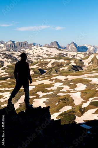 Silhouette of hiker above Stony Pass, Silverton, Colorado, USA photo