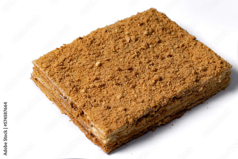 cake Medovik on white background. Close up view cake Medovik on white background. Close up view