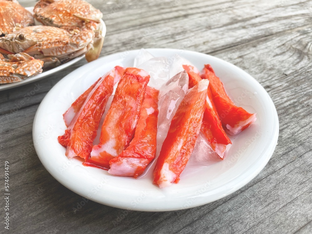 Crab sticks on wood background Crab sticks on wood background