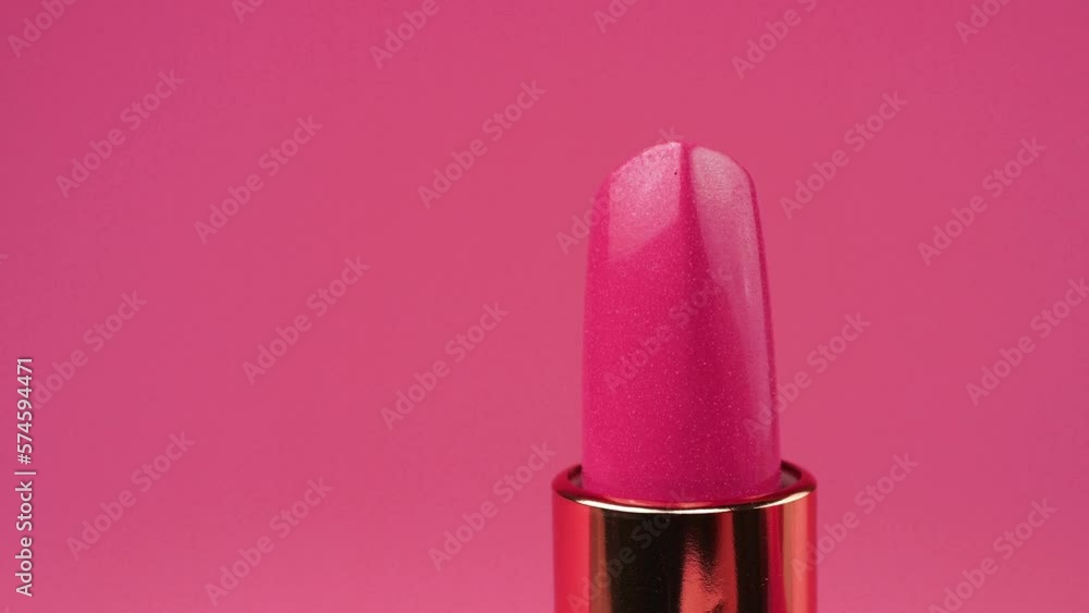 Lipstick on a pink background. Lipstick on a pink background.