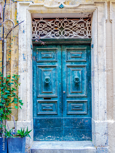 close up retro style old house door of Mediterranean architectural culture in Mediterranean island Malta