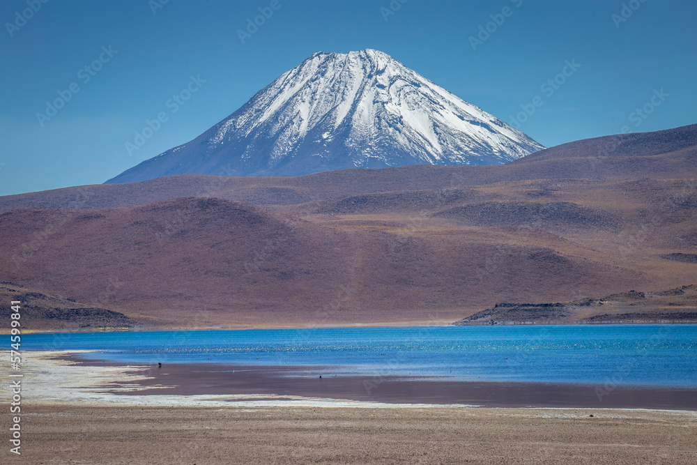 Salt lake, turquoise Laguna Miscanti, volcanic landscape at sunrise, Atacama