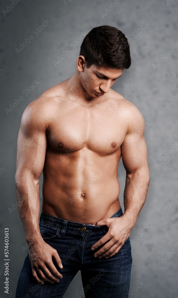 Muscular young handsome man posing