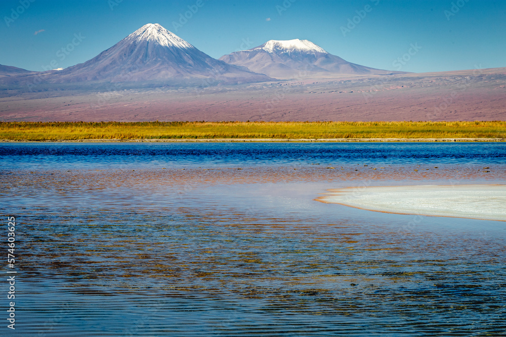Licancabur with reflection lake and volcanic landscape at Sunset, Atacama, Chile