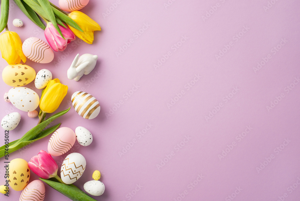 Easter decorations concept. Top view photo of colorful easter eggs ceramic bunny yellow and pink tulips on isolated pastel violet background with empty space