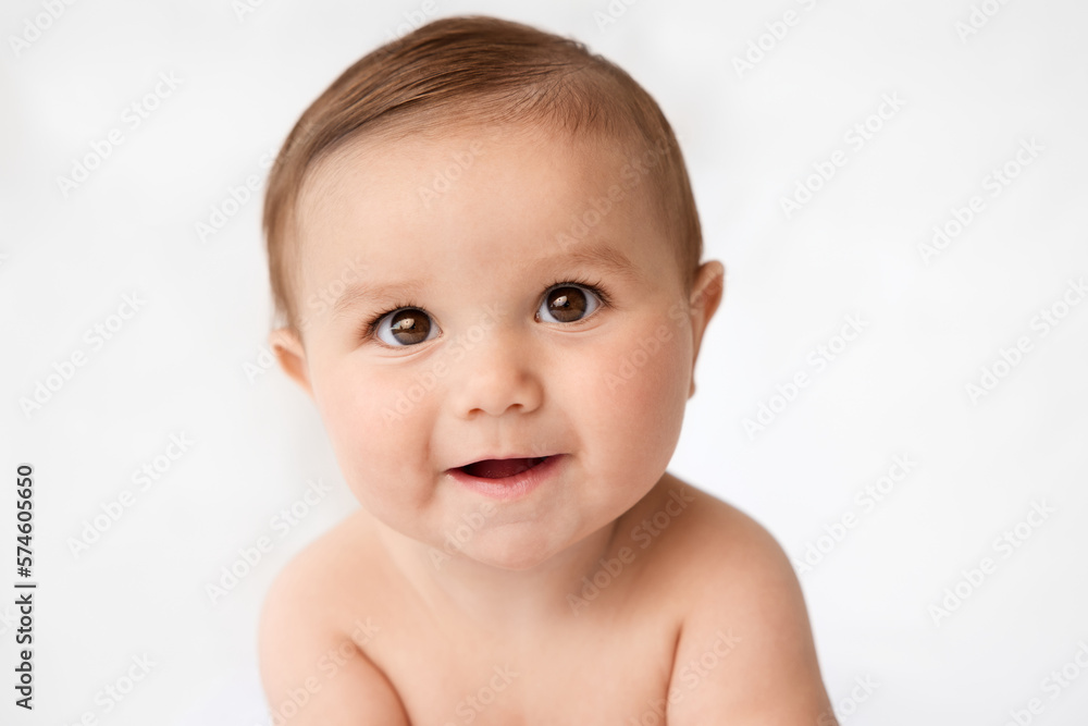 Close-up portrait of smiling brown-eyed baby Close-up portrait of smiling brown-eyed baby