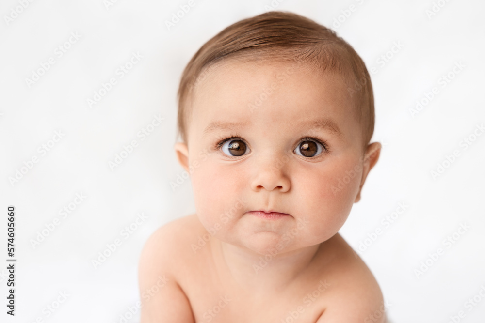 Close-up portrait of funny baby with surprised expression Close-up portrait of funny baby with surprised expression
