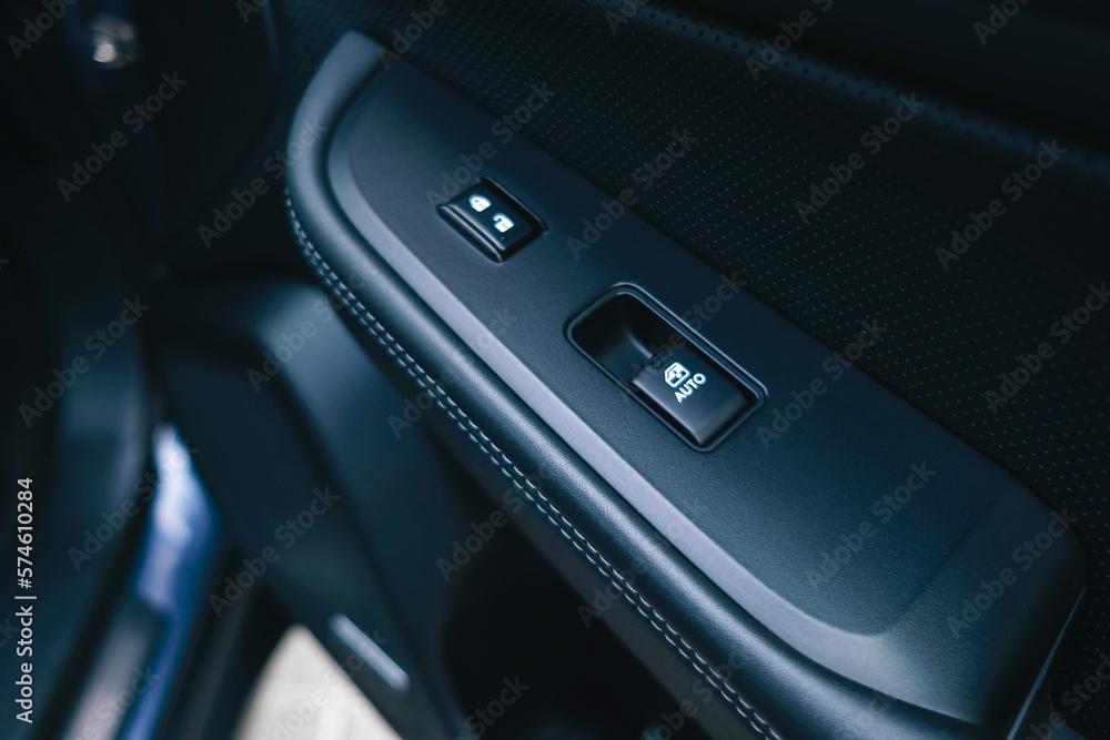 Luxury black car interior. Details interior. Main control panel for