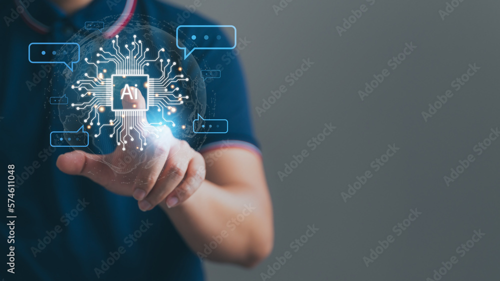 Man's hand with an AI chat icon, representing the use of artificial intelligence and messaging technology in modern communication and business environments Man's hand with an AI chat icon, representing the use of artificial intelligence and messaging technology in modern communication and business environments