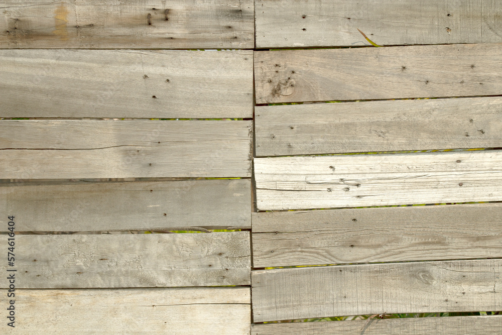 Obraz premium Background of an old wooden wall that forms a fence