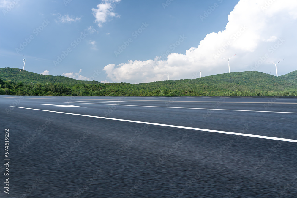 Fototapeta premium Road and outdoor distant mountain landscape