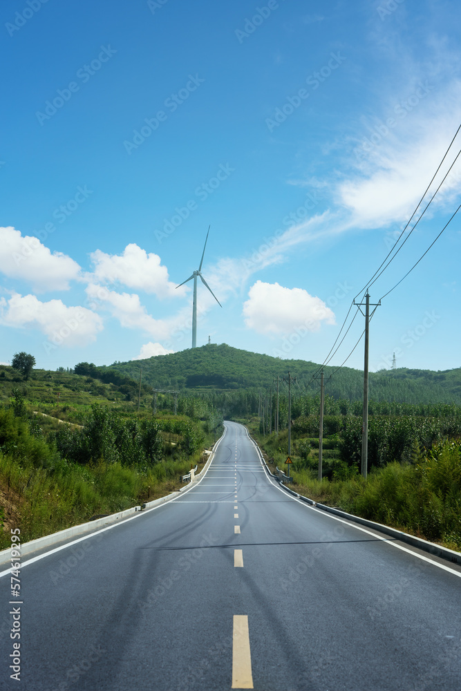 Fototapeta premium Road and outdoor distant mountain landscape