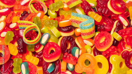 Assorted colorful gummy candies. Top view. Jelly donuts.