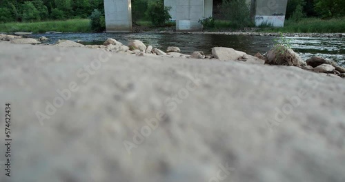 Panning from Ground to Bridge and River photo