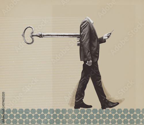 Fotografie Smartphone addicted user with wind-up key