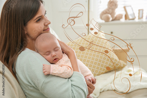 Cuadro en lienzo Mother singing lullaby to her baby at home