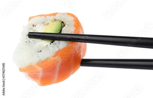 Chopsticks with delicious fresh sushi roll isolated on white