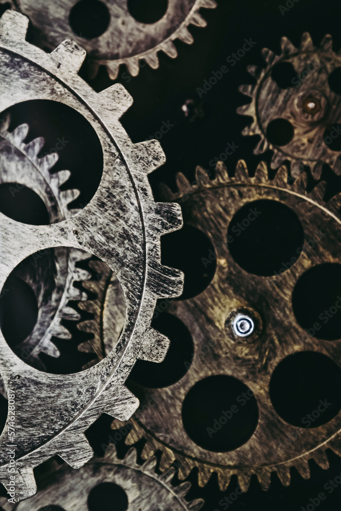 Macro sur des roues à dent métalliques - Engrenage d'horloge ancienne