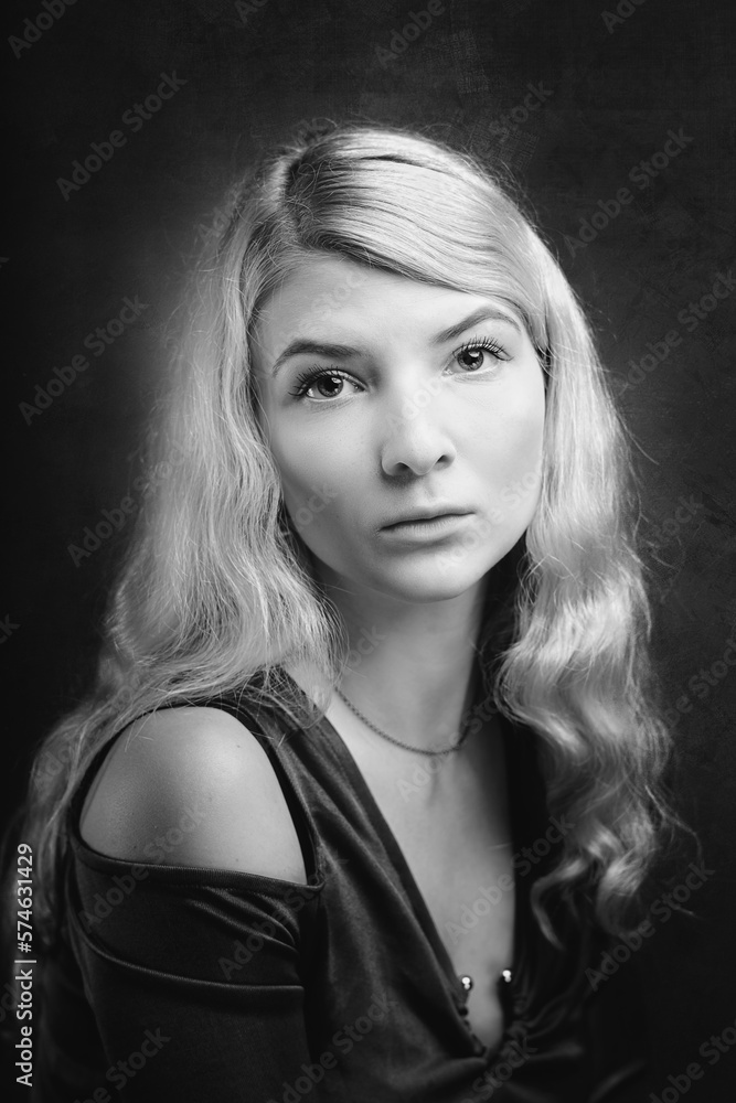 retro styled monochrome female portrait. Attractive blonde looking at camera retro styled monochrome female portrait. Attractive blonde looking at camera