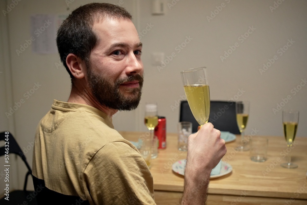 Young caucasian man drinking champagne Young caucasian man drinking champagne