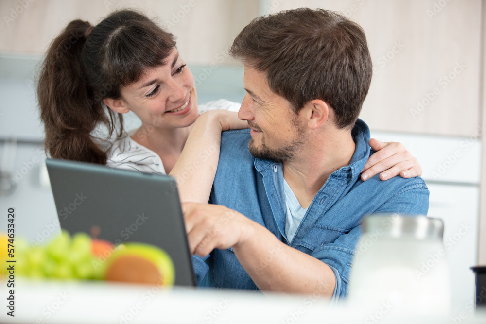 happy young couple with digital tablet happy young couple with digital tablet