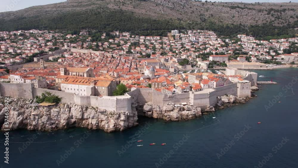 Dubrovnik, Croatia. Aerial View of Medieval Fort, Buildings and Walls by Adriatic Sea Dubrovnik, Croatia. Aerial View of Medieval Fort, Buildings and Walls by Adriatic Sea
