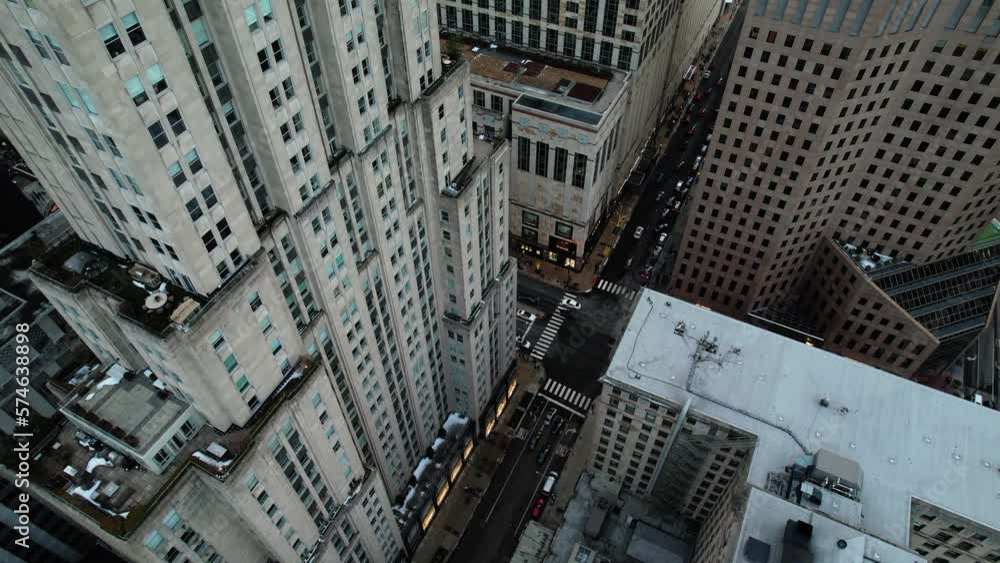 cinematic aerial orbiting while tilting up at the end. Chicago city streets. Establisher shot 4k USA cinematic aerial orbiting while tilting up at the end. Chicago city streets. Establisher shot 4k USA