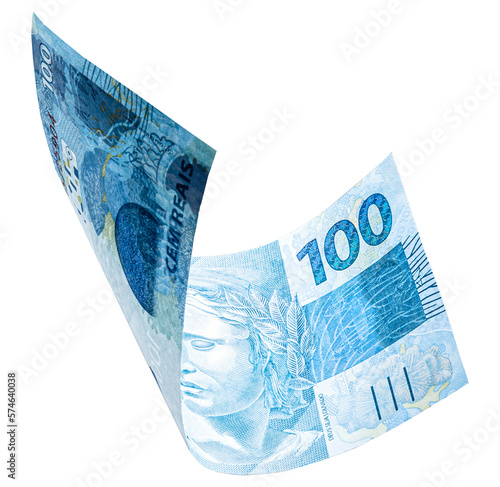 banknote of one hundred reais from brazil falling on isolated white background