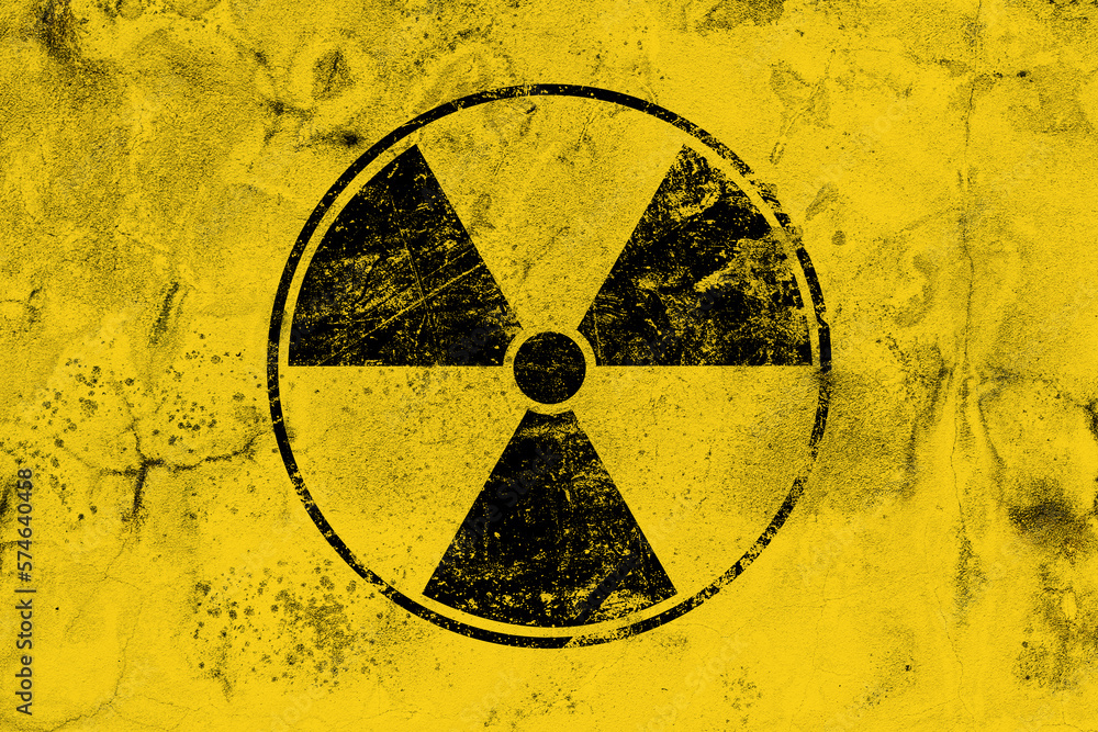Obraz premium Black radioactive sign over yellow background