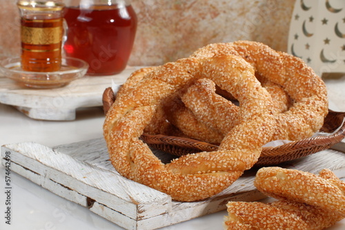 Simit or Turkish bagel with sesame,is traditional Turkish bakery food. Turkish name; simit - gevrek photo