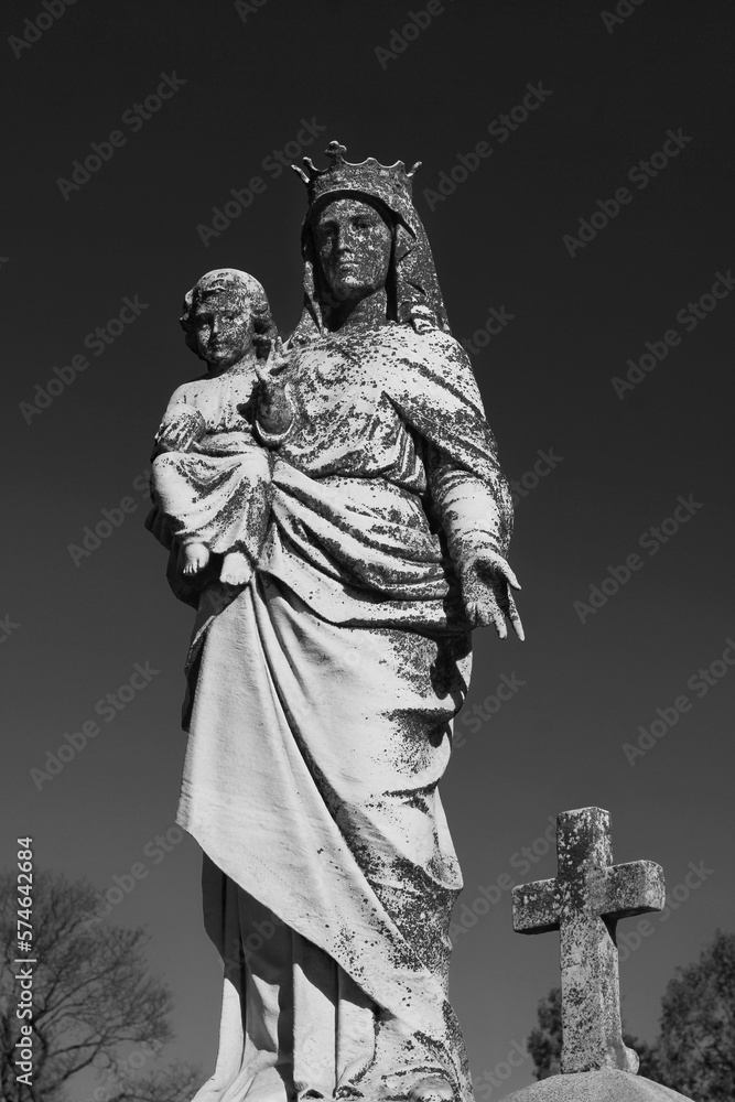 Queen Mary holding her baby son, Jesus, in black and white.