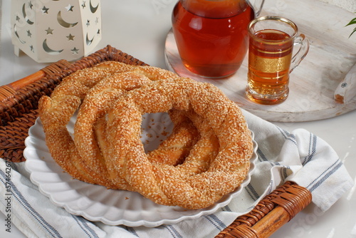 Simit or Turkish bagel with sesame,is traditional Turkish bakery food. Turkish name; simit - gevrek photo
