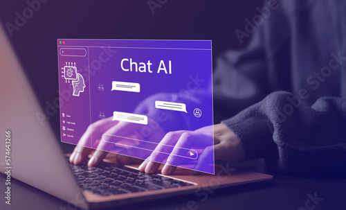 Chat Bot Chat with AI or Artificial Intelligence technology. Woman using a laptop computer chatting with an intelligent artificial intelligence asks for the answers he wants. ChatGPT,