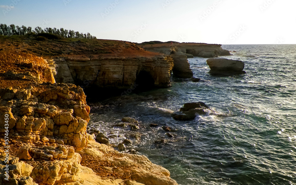 Water caves and rock formations close to Coral Bay on Cyprus Island.