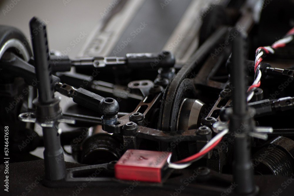 RC radio control model car chassis at mechanic fix, visible internal