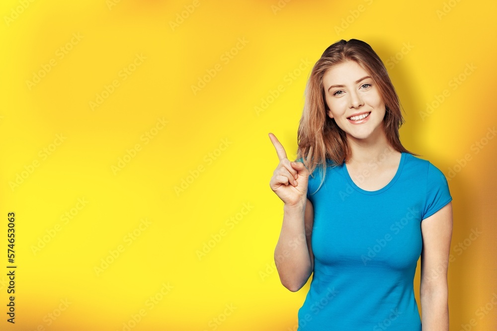Happy young smile woman posing on color background Happy young smile woman posing on color background