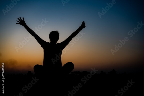 strong confidence woman open arms under the sunset