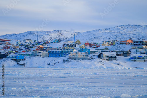 Colorful houses of Ilulissat on Greenland, Denmark, Scandinavia. The settlement is the third largest city on the island and is home to the largest Icefjord in the world.