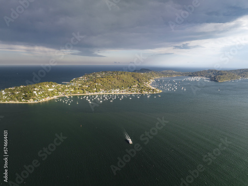 High angle aerial evening drone view of Palm Beach, Whale Beach and Stokes Point (Avalon), all affluent beachside suburbs in the Northern Beaches region of Sydney, New South Wales, Australia. photo