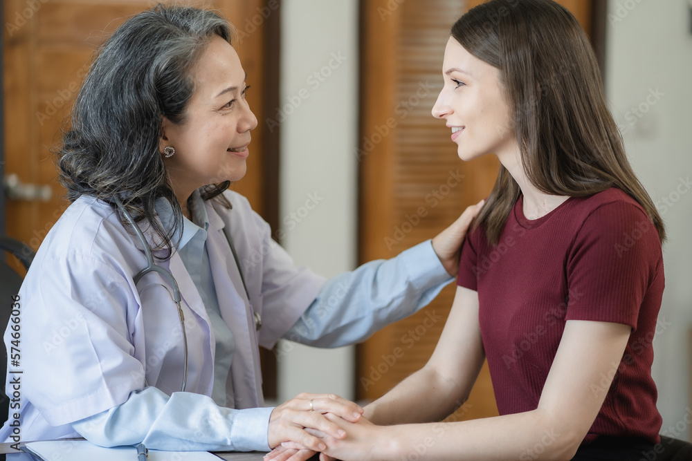 Fototapeta premium doctor she is encouragement while recommending medications at the clinic.