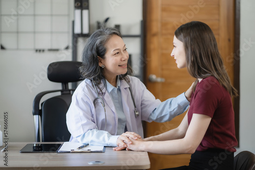 doctor she is encouragement while recommending medications at the clinic.