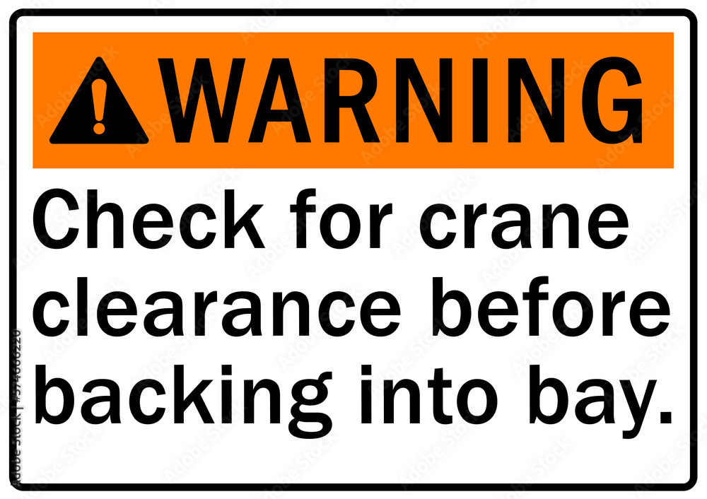 Overhead crane hazard sign and labels check for crane clearance before backing into bay