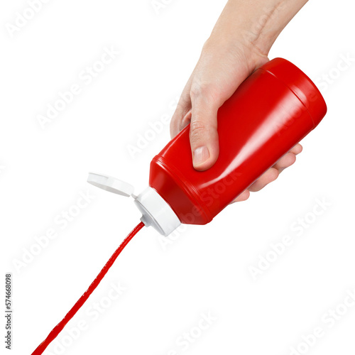 Fotografi Hand squeezing ketchup out of a plastic bottle, cut out