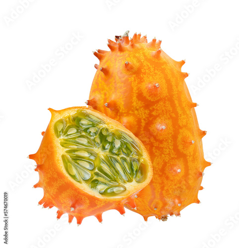 Whole and a half of kiwano fruit or horned melon, close up.