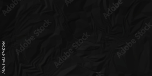 Dark Black facbric paper backdrop crumpled texture. dark black textured crumpled black paper background. panorama black paper texture background, crumpled pattern. © MdLothfor