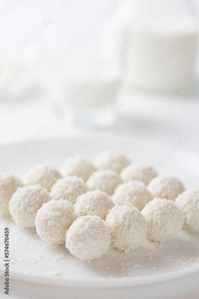 Coconut cakes light dessert in the form of balls on a light background Coconut cakes light dessert in the form of balls on a light background